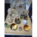 A tray of five graduated glass candlesticks in the style of Whitefriars, glass bell,