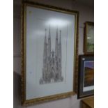 A gilt framed architectural print depicting a cathedral