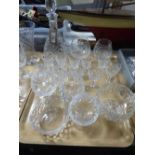A tray of cut glass wine glasses, brandy glasses,