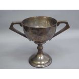 A silver twin handled trophy cup, 674.3g.