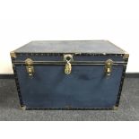 A large metal bound travelling trunk