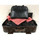 A suitcase of lady's hand bags - Radley, etc,