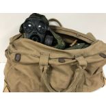 A large holdall containing army DP holdalls,