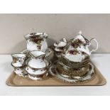 A tray containing a twenty-two piece Royal Albert Old Country Roses tea service together with eight