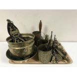 A tray containing a large quantity of assorted brassware including shell casing, hand bells,