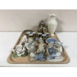 A tray of Belleek vase, miniature oriental eggshell tea service, Spanish figures,