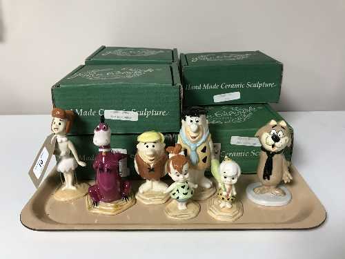 Six boxed John Beswick Flintstone figures and a boxed John Beswick Top Cat figure