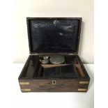 A Victorian rosewood brass bound box