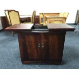 A hostess trolley in mahogany cabinet