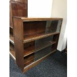 A mahogany three tier stacking bookcase