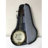 A Savana eight string banjo mandolin in carry case