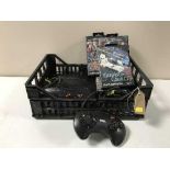 A box containing Sega Megadrive 2 with controller and games,