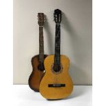 Two Spanish acoustic guitars and a Harmony acoustic guitar