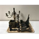 A tray containing metal five-way candelabra, small brass embossed pot,