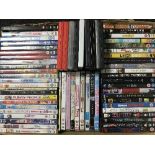 Three boxes of assorted DVDs