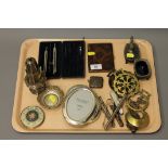 A tray containing plated wares, horse brasses, silver vesta, writing utencils,