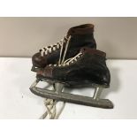 A pair of vintage ice skates