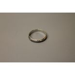 An 18ct gold band ring, 4.2g.