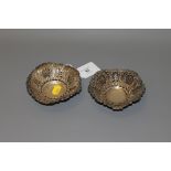 A pair of pierced silver bonbon dishes,