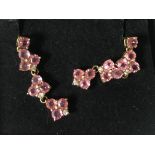 A pair of 9ct gold pink sapphire and diamond earrings