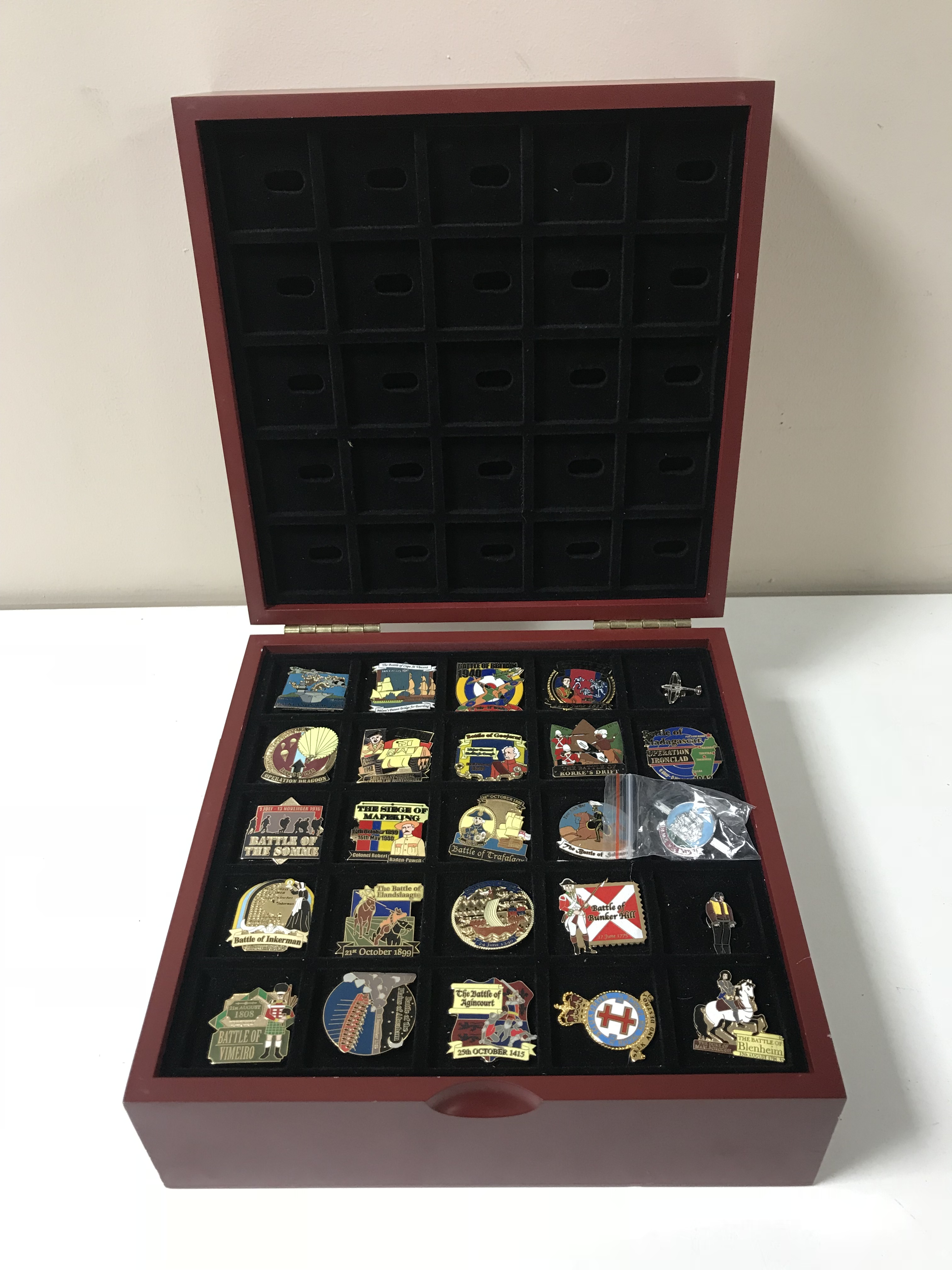 A cased set of British Victory enamel pin badges issued by the Danbury Mint.