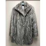 A grey mink fur coat