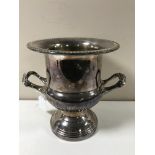 A silver plated antique style twin handled wine cooler