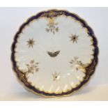 Caughley plate of lobed circular form with blue & gilt rim,