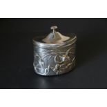 Edwardian silver small caddy with straight sides embossed with convolvulus by W Comyns, 1902,