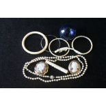 Two cameo brooches, two pearl necklets and various other items.