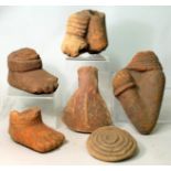 Six fragments of antique Nigerian Nok terracotta pottery comprising: arm with clenched fist,