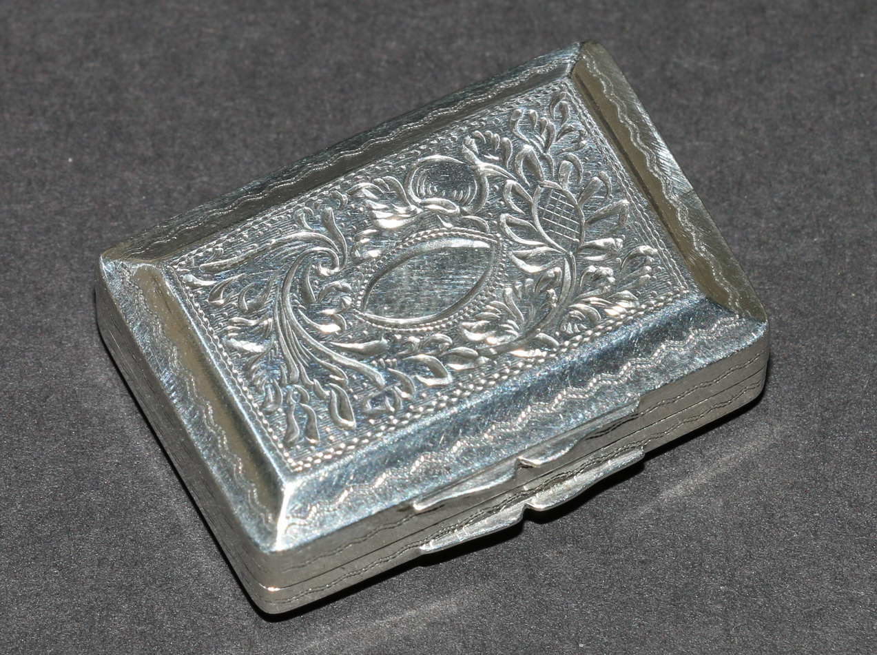 Silver rectangular vinaigrette with incurved edges scrolling grille, by John Bettridge, Birmingham,