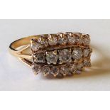 Diamond ring with three rows of brilliants, in gold.