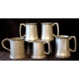 Five various 19th century pewter mugs.