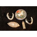 Silver 1895 crown, enamelled and three brooches and an ingot pendant.