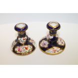 Pair of Spode small taper or candlesticks, each of baluster form on circular base,