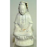 Chinese Republic large blanc de chine figure of Guanyin seated cross legged on a lotus throne,