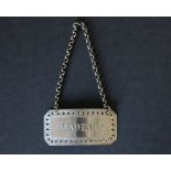 Silver decanter label, rectangular, with pierced border engraved for 'Madeira', by W. P.