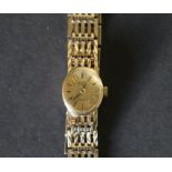 Lady's 9ct gold bracelet watch.