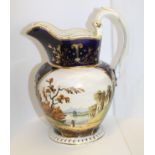 Coalport water jug of characteristic baluster form with gadrooned rim & branch scroll handle on