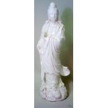 Chinese Republic large blanc de chine figure of Guanyin, standing on lotus base,