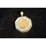 American 5 dollars in diamond set gold mount, 10g gross.