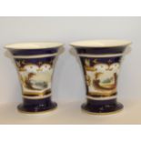 Pair of 19th century Staffordshire spill vases, each of tapering form with everted rim,