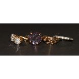 Four 9ct gold gem set rings.