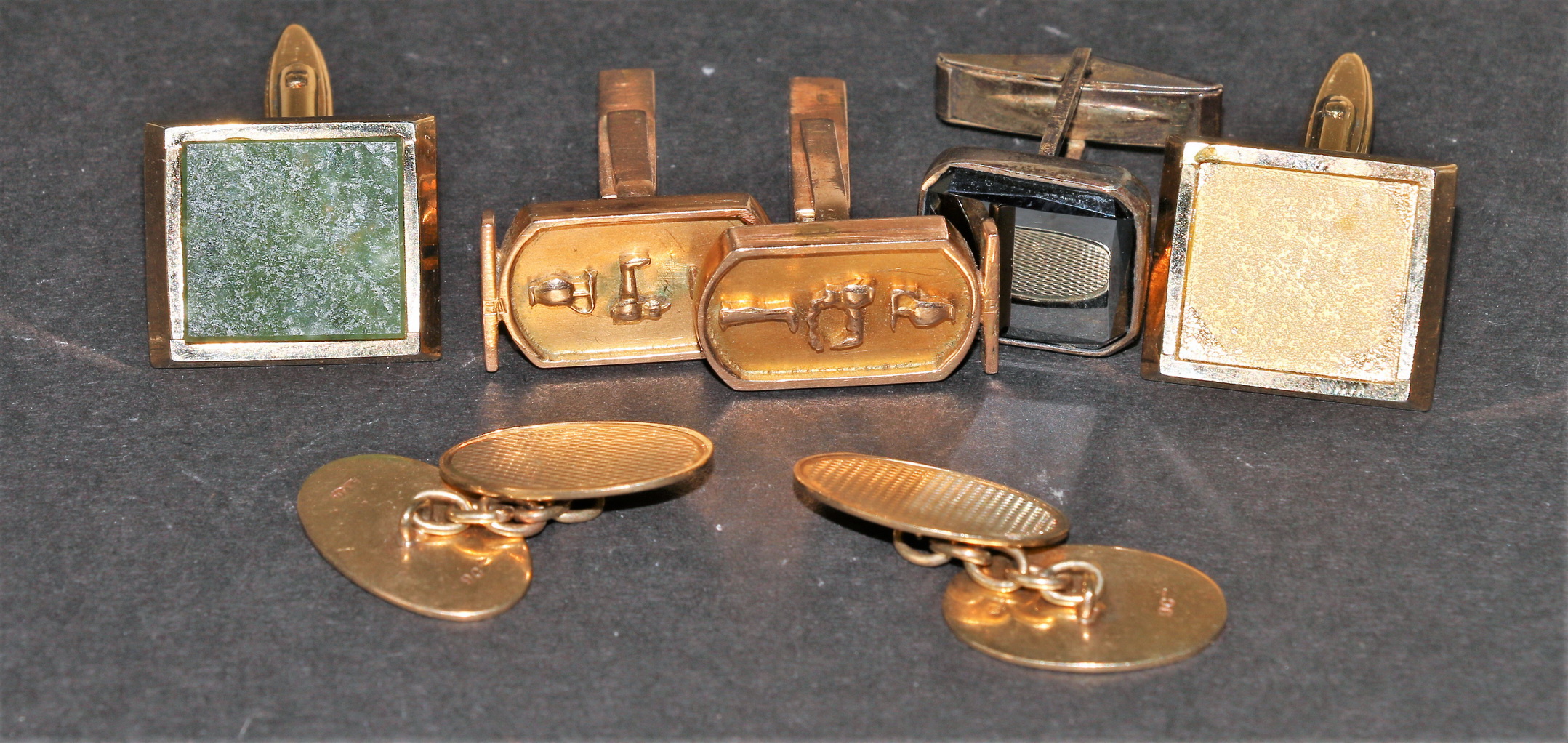 Two pairs of gold cufflinks and various others. Condition Report.