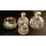 Four silver mounted glass toilet jars (4)