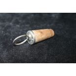 Bottle cork with silver mount and plain ring pull by J.