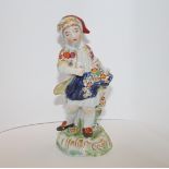 Derby figure of a child flower seller,