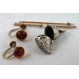 Pair of amber and gold earrings, a pearl brooch and a silver pendant.