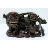 Early 20th century Chinese carved hardwood group of two dogs of Fo,